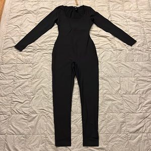SKIMS ALL-IN-ONE SCOOP NECK LONG SLEEVE ONESIE